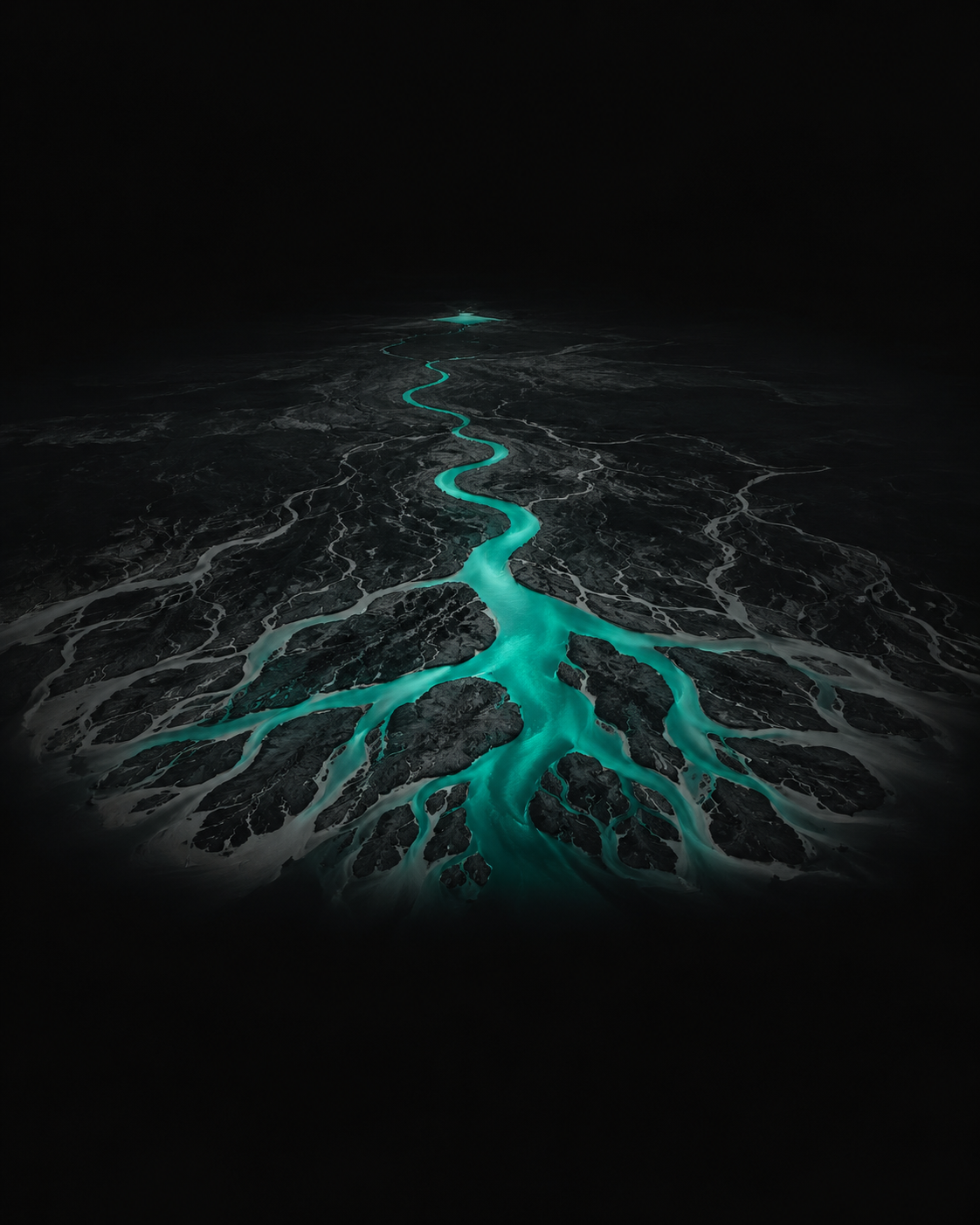A luminous river branching across a dark landscape
